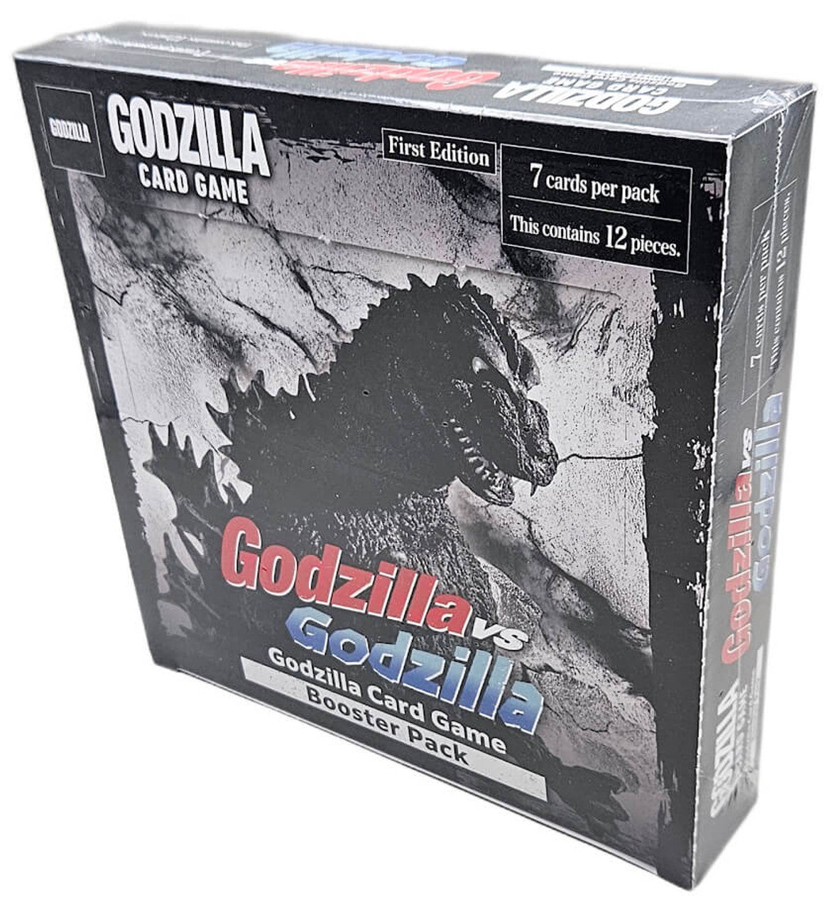 A sealed black Godzilla Card Game First Edition booster box with Godzilla art, containing 12 packs of 7 cards