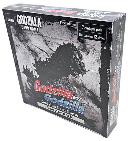 A sealed black Godzilla Card Game First Edition booster box with Godzilla art, containing 12 packs of 7 cards