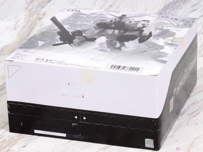 Retail box for Mobile Suit Ensemble Part 09 model kit. Features a black and white graphic of a mech