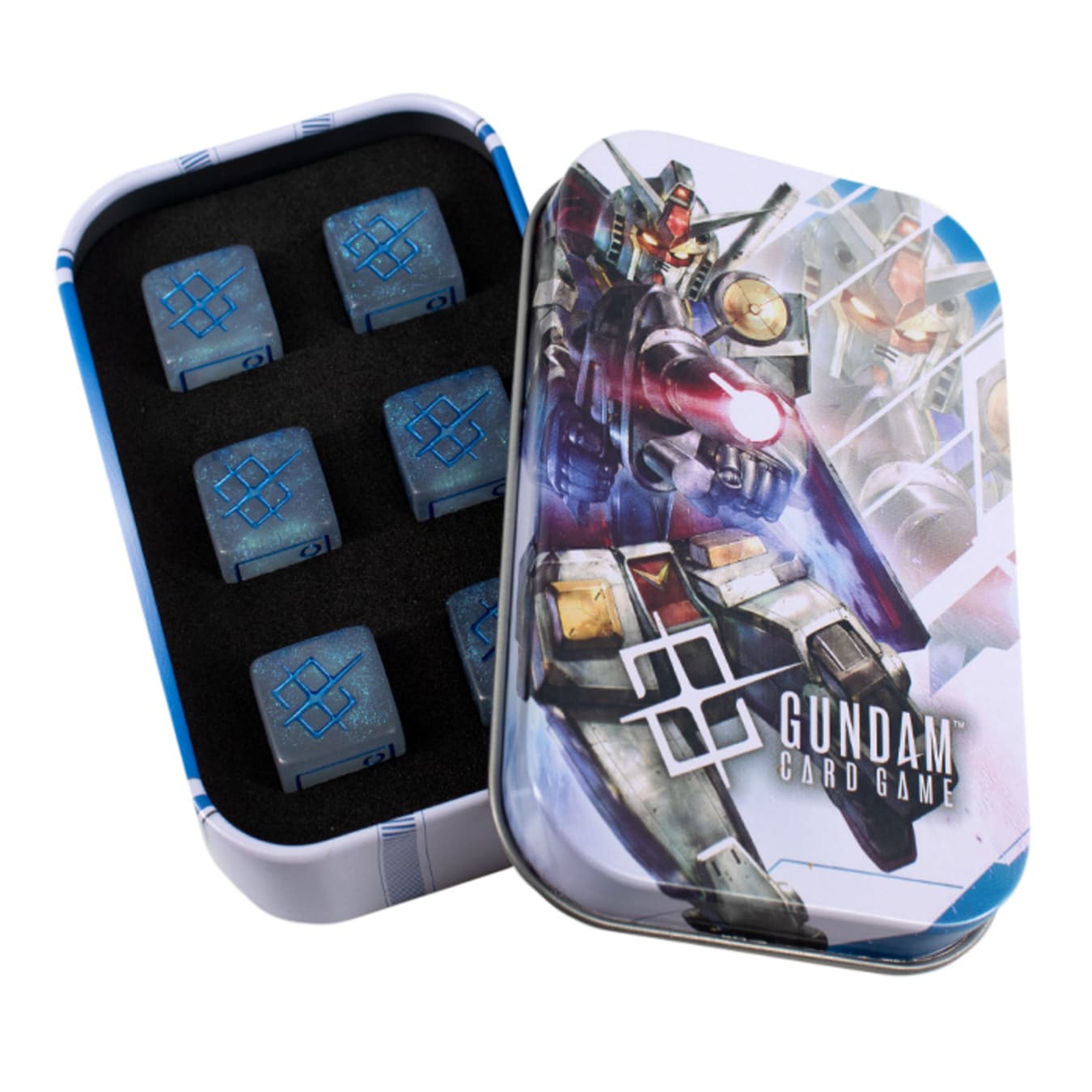 Opened Gundam Card Game tin with robot art on lid, displaying six blue symbol-etched game dice on black foam