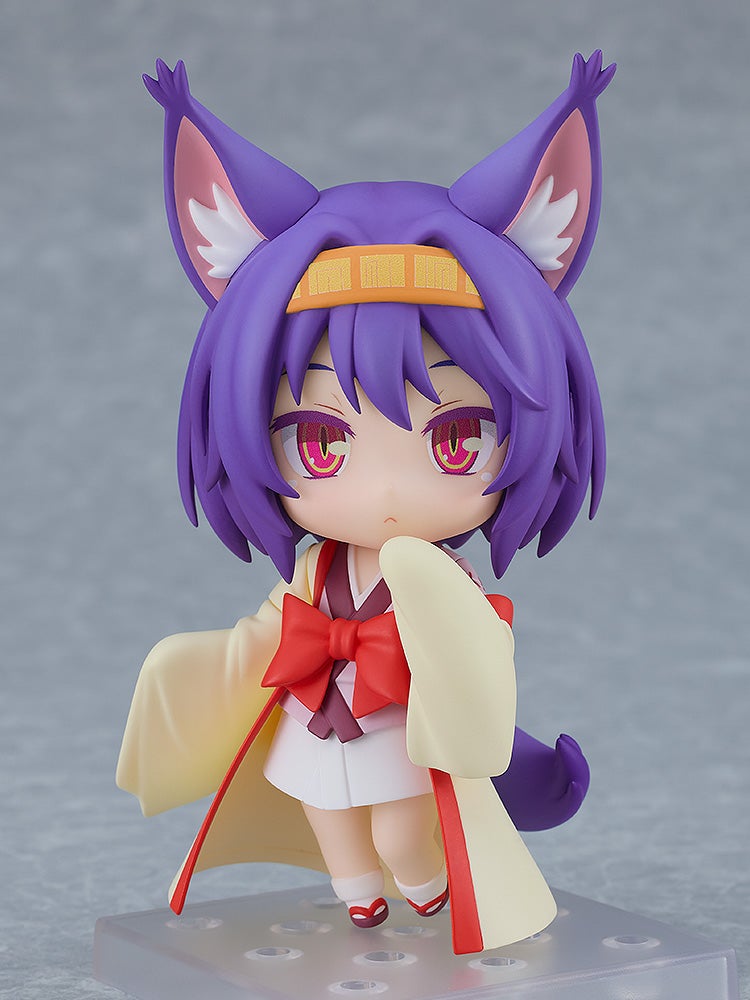 Nendoroid figure of anime character with purple hair and fox ears wearing a flowing white kimono and red bow tie on color background