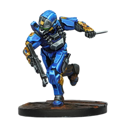 A blue sci-fi armored soldier miniature in a dynamic run, holding a rifle and knife, with a green visor