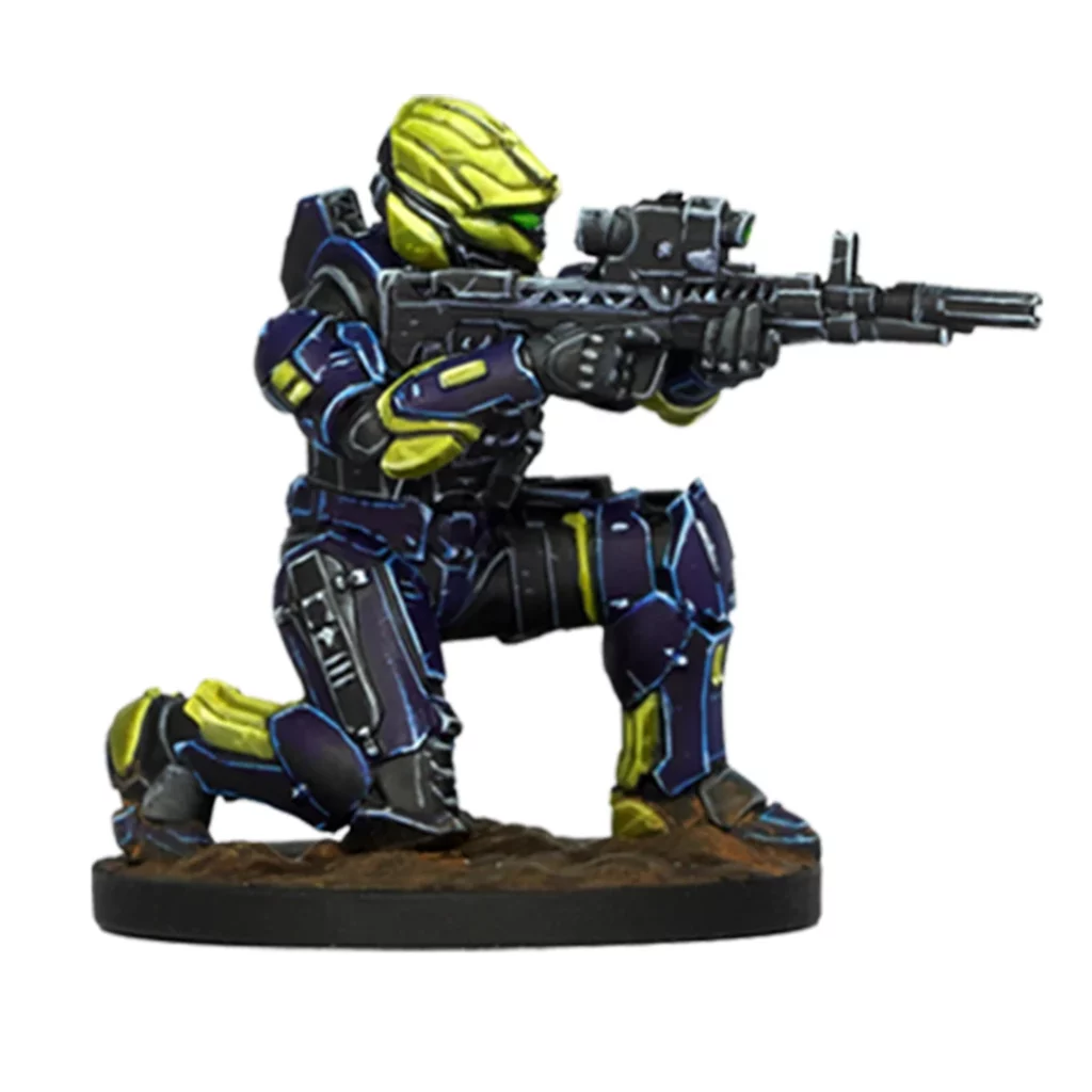 A miniature armored soldier in dark purple-blue and lime green armor kneels, aiming a rifle