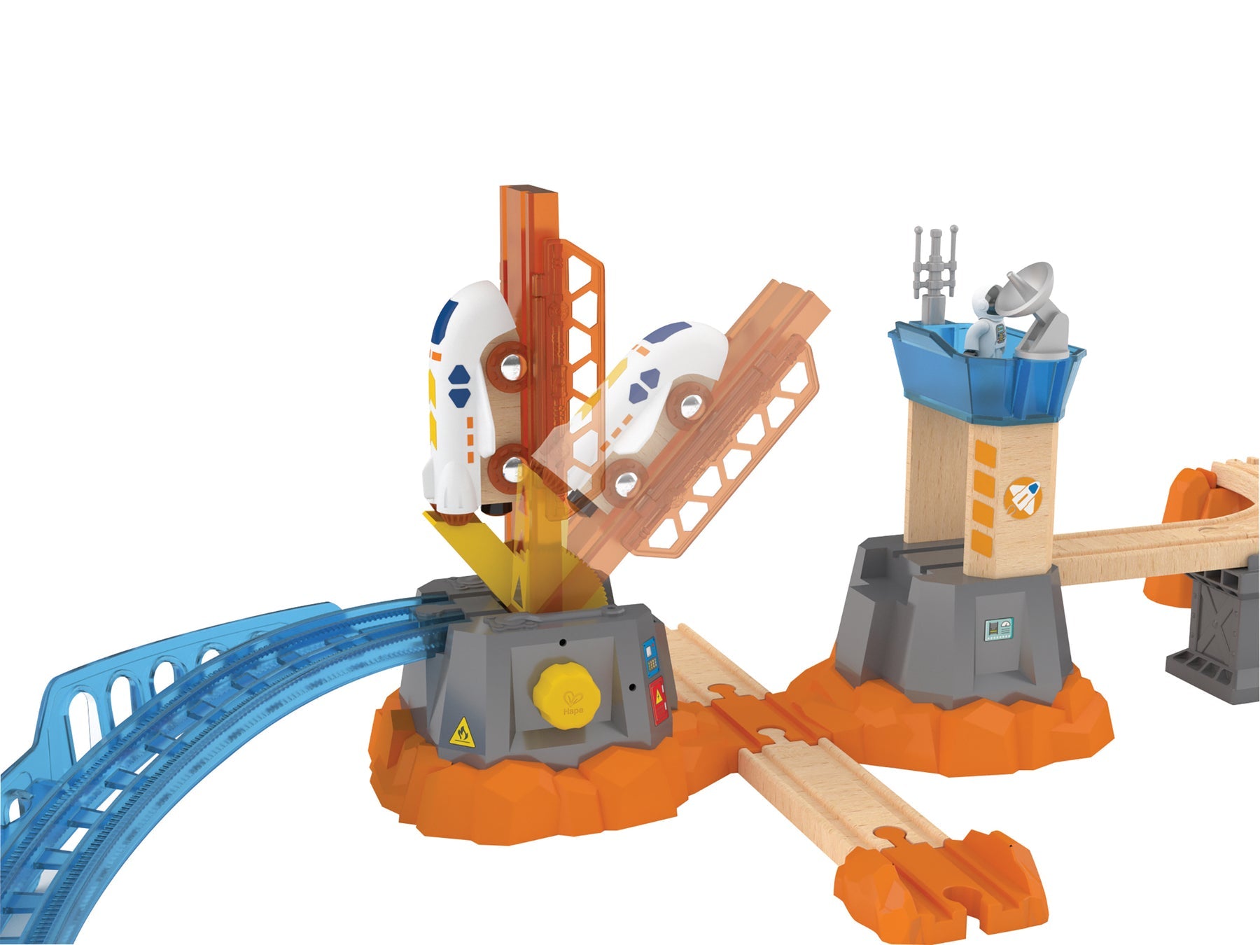Toy space station train set showing a rotating track launching a rocket car, beside a control tower