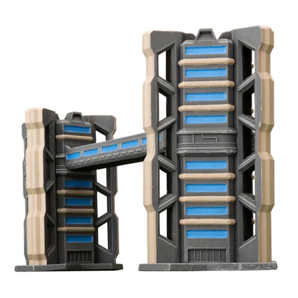 Two gray and tan sci-fi model buildings with blue panels, connected by a bridge