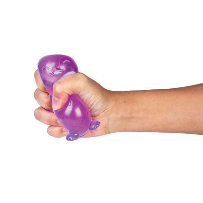 Hand squeezing a purple, translucent penguin stress toy