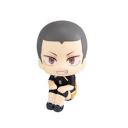 Chibi anime figure wearing black #5 volleyball jersey, short gray hair, seated