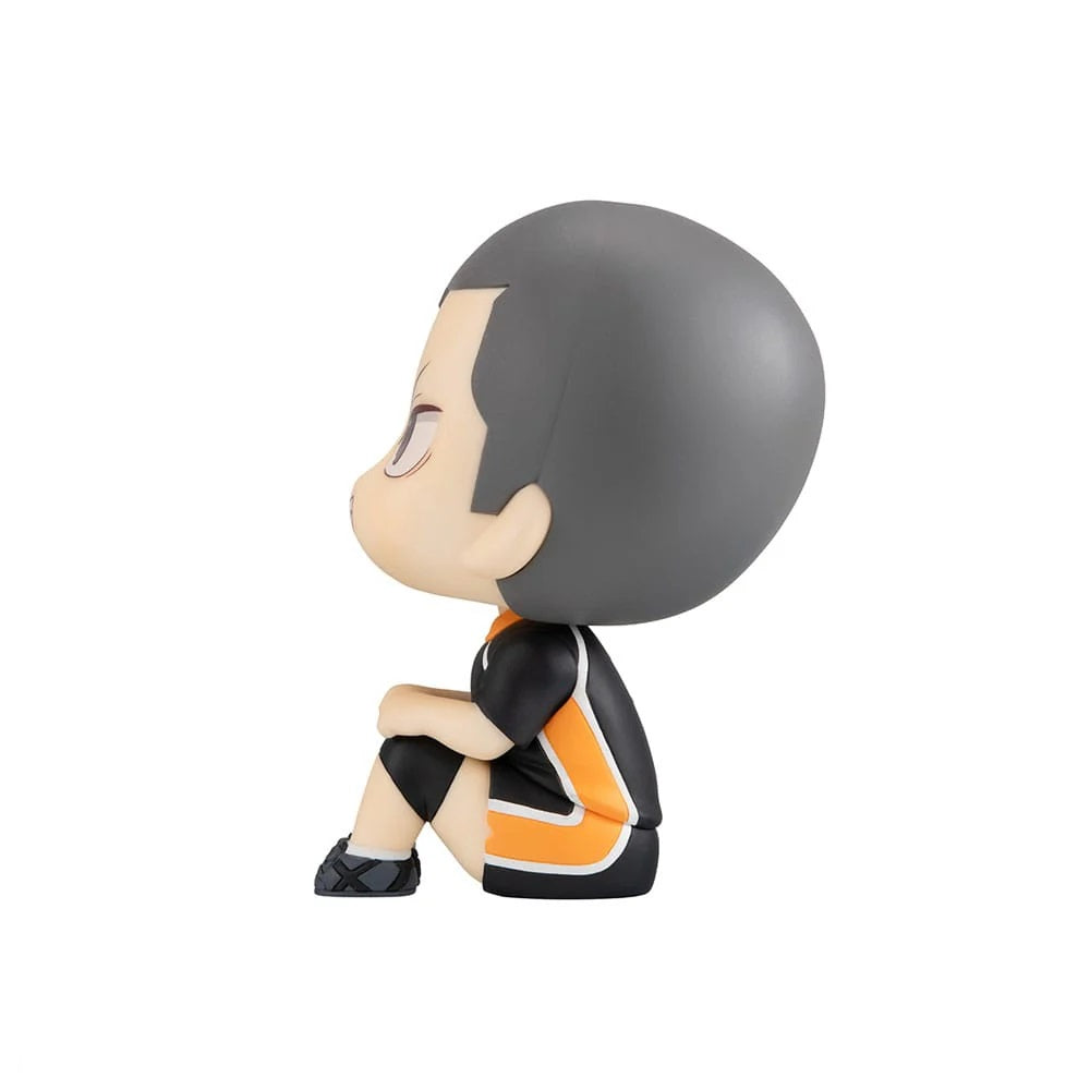 Chibi anime figure, profile view, sitting with knees pulled up, Wearing a black and orange volleyball uniform