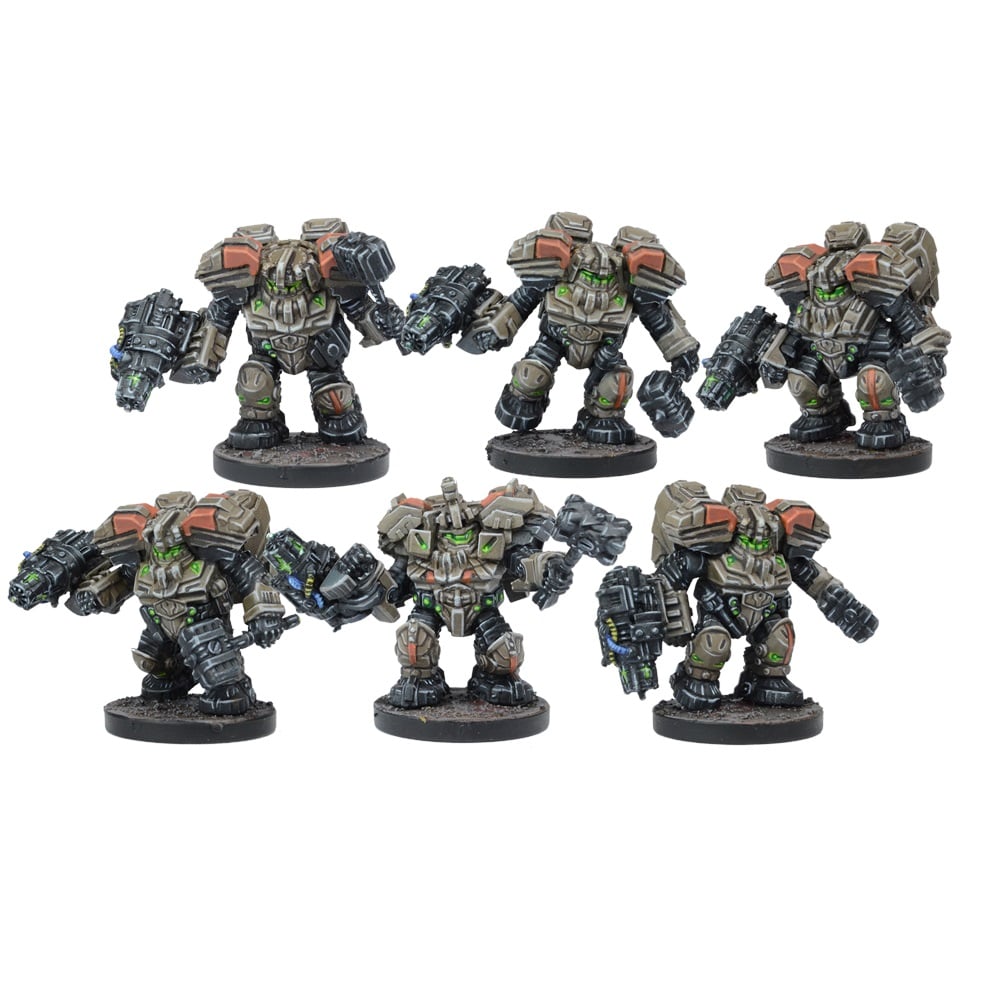 Six grey, orange & green sci-fi wargame miniatures. Armored mech-like figures with heavy weapons