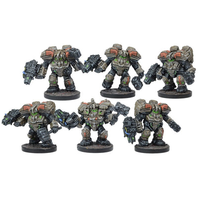 Six grey, orange & green sci-fi wargame miniatures. Armored mech-like figures with heavy weapons