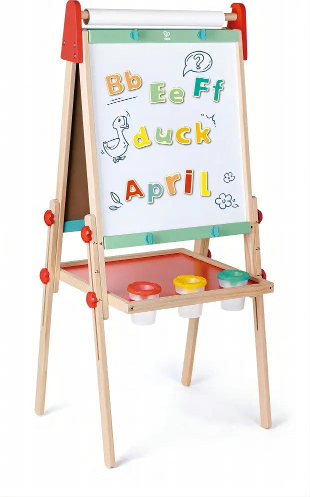 A colourful wooden children's easel with magnetic letters, a duck drawing, and paint pots on the tray.