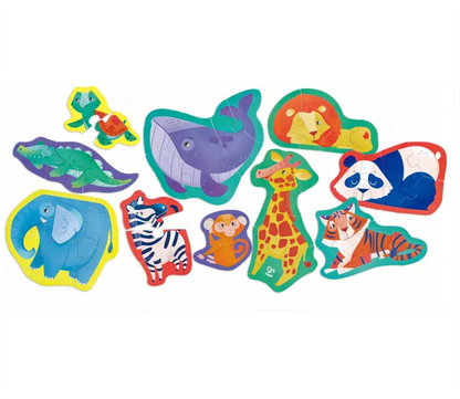 Colourful cartoon animal jigsaw puzzles, including a whale, elephant, lion, panda, giraffe, and tiger on white.
