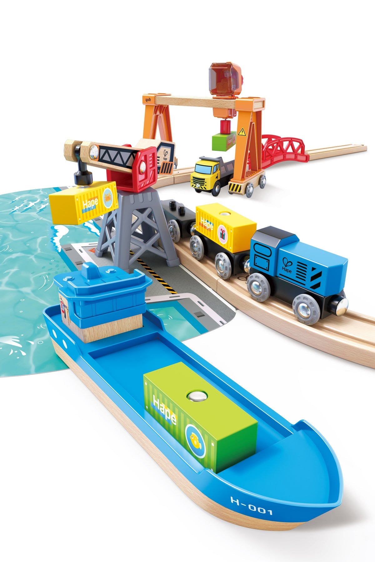 Toy Hape cargo ship, train, and cranes transferring containers at a wooden railway port set