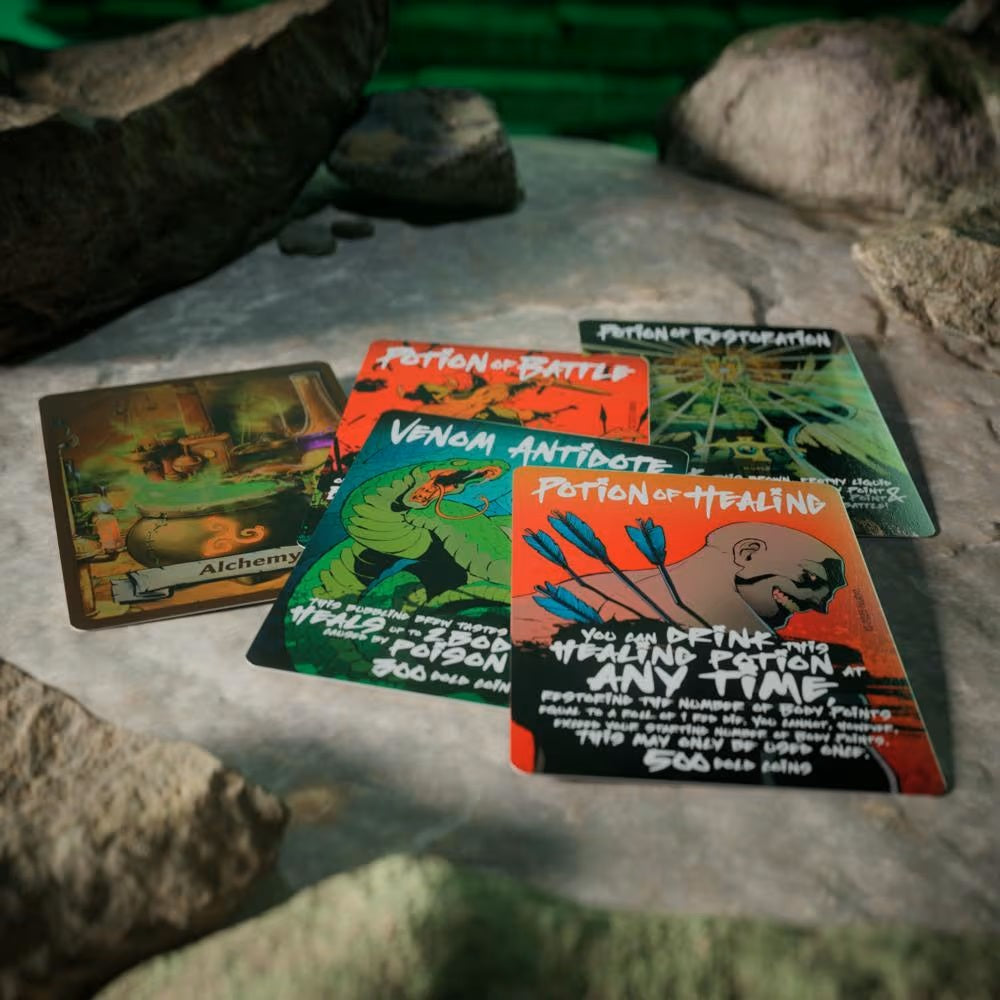 Colorful fantasy game cards, like "Potion of Healing" and "Alchemy," fanned out on a rocky surface