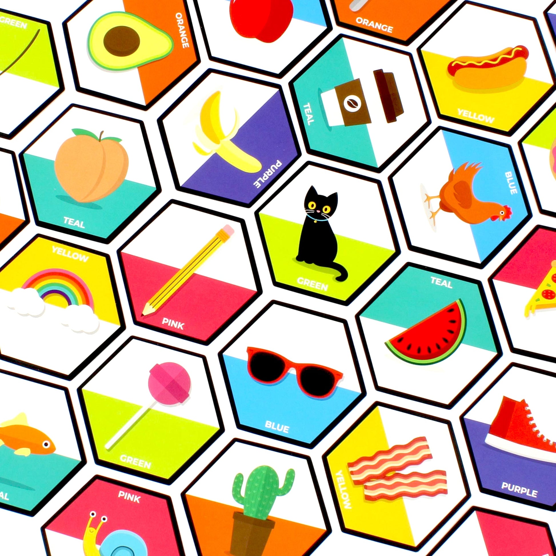 Arrangement of colorful hexagonal game tiles, each with a cartoon illustration (cat, watermelon) and a color label