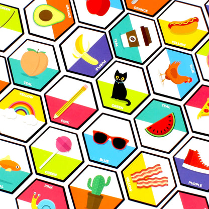 Arrangement of colorful hexagonal game tiles, each with a cartoon illustration (cat, watermelon) and a color label