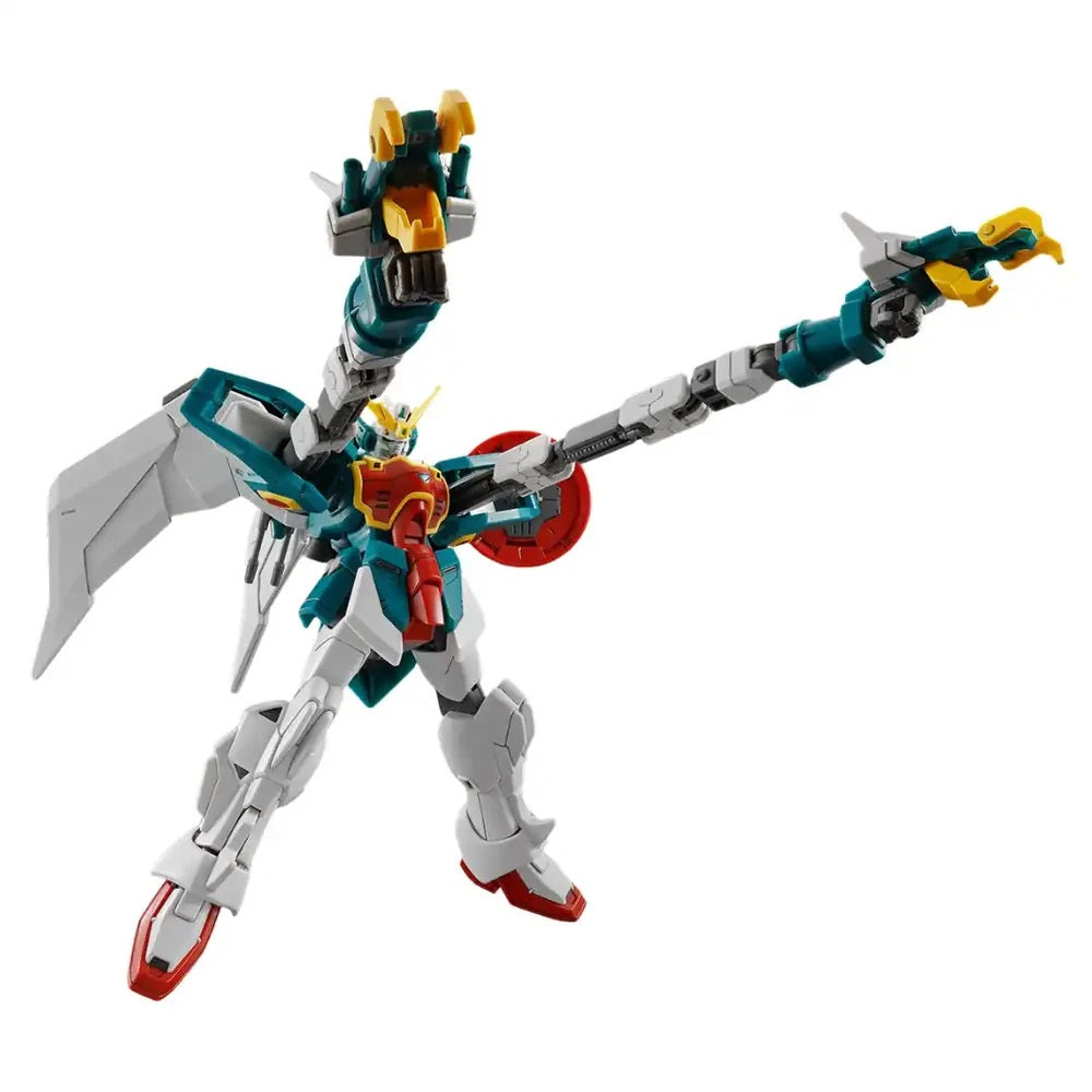 Teal and white Gundam model with large wings and two long dragon arms extended dynamically
