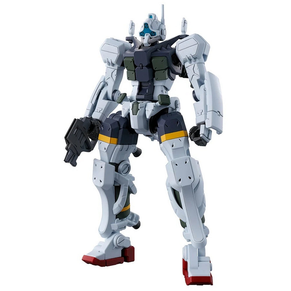 A white and dark gray mecha model stands, holding a black blaster