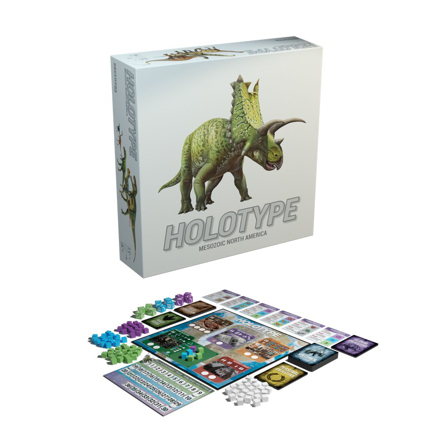 A Holotype board game box, featuring a green horned dinosaur, sits above the game's board, cards, and colorful tokens