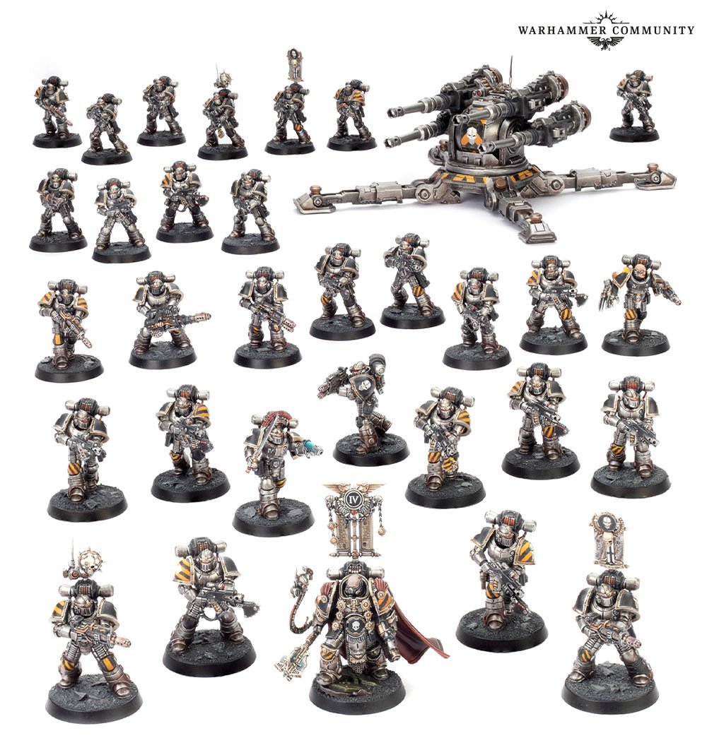 A collection of painted Warhammer Space Marine miniatures in grey and yellow/black, with a large triple-barreled cannon