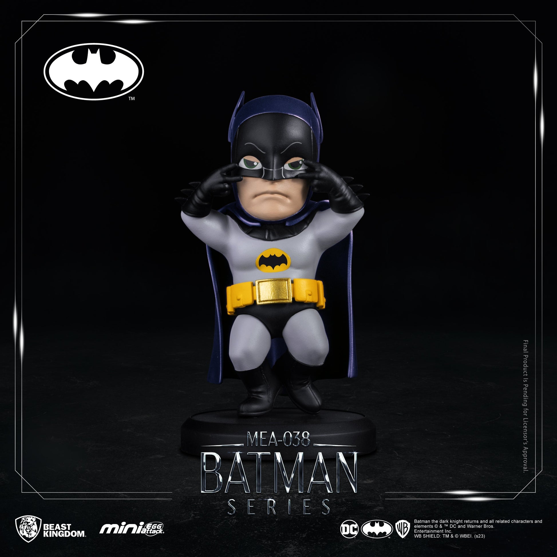 Detailed view of Batman figure in action pose with cape flowing