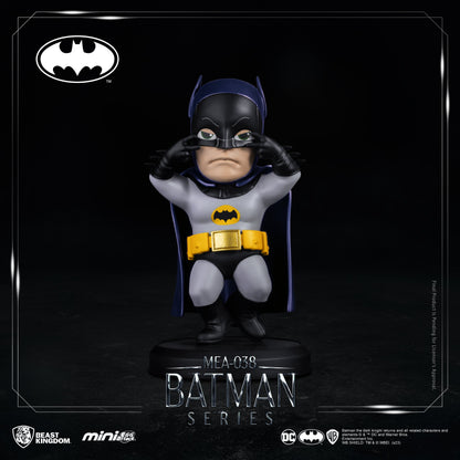 Detailed view of Batman figure in action pose with cape flowing