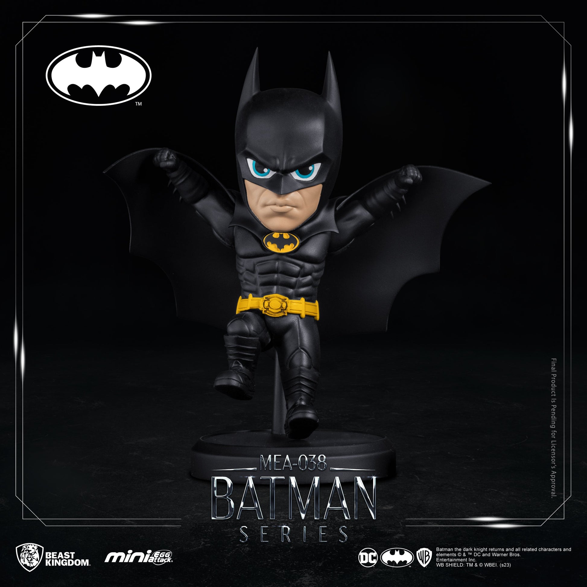 Batman figure holding gadget, displayed on black round base