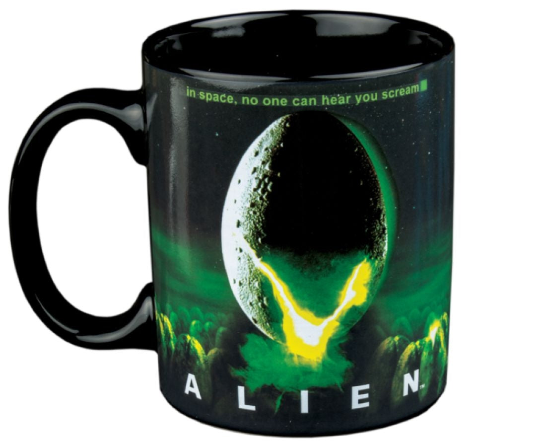 Black coffee mug featuring the classic Alien movie poster art: cracked egg silhouette, title, and tagline