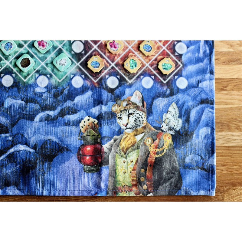 Sir Ocelot&#39;s Cave art print tabletop playmat featuring an elegant snow leopard with a lantern