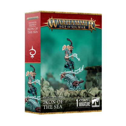 Warhammer Age of Sigmar 'Ikon of the Sea' miniature box. An elf warrior with a curved blade rides a large stylized wave