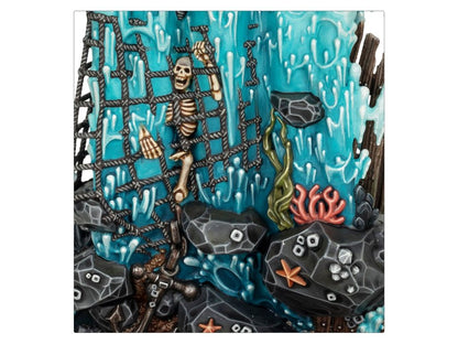 Skeleton caught in a fishing net underwater, surrounded by blue currents, rocks, seaweed, and coral