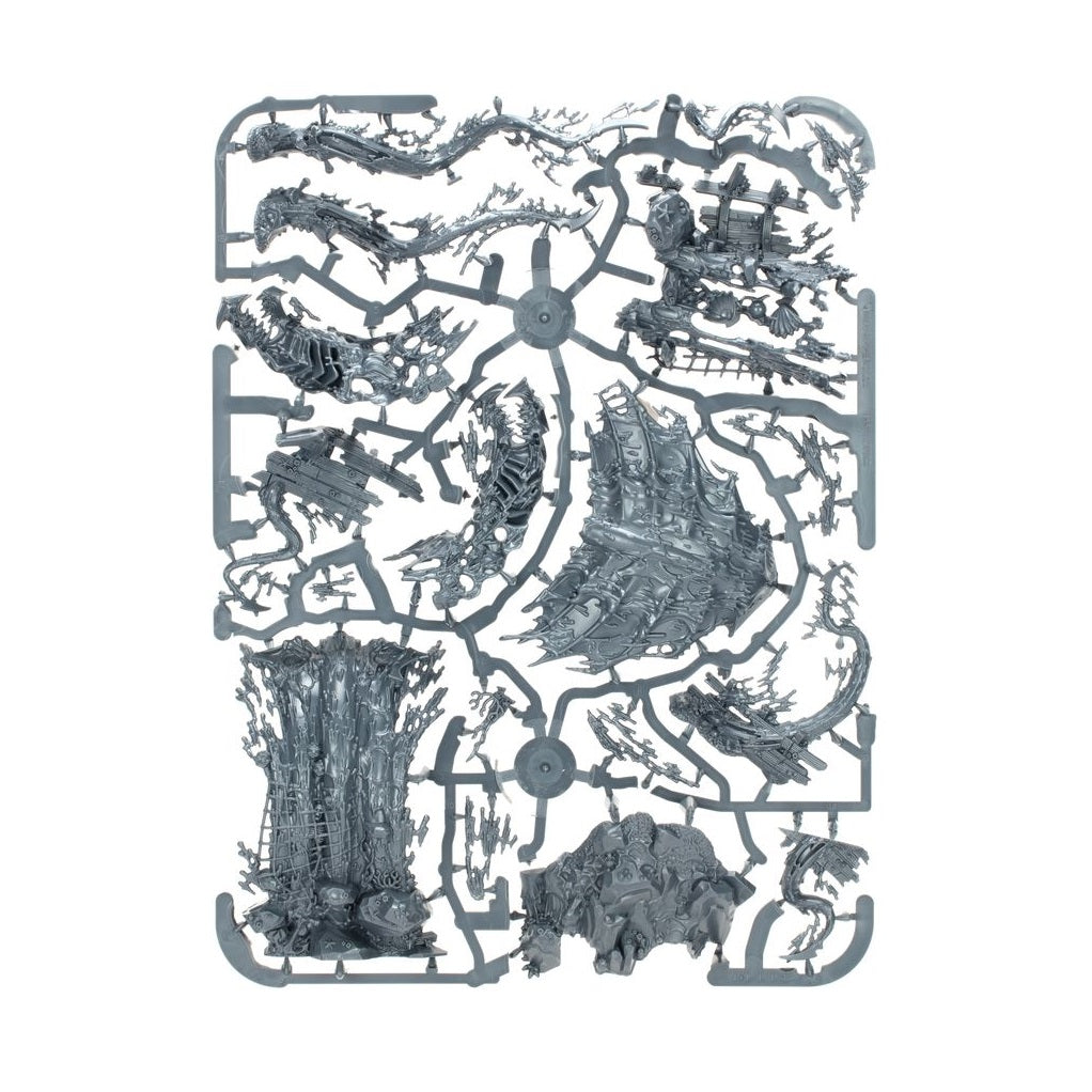 Grey plastic sprue displaying complex, unbuilt model kit parts with skeletal and ship-like features