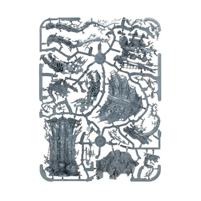 Grey plastic sprue displaying complex, unbuilt model kit parts with skeletal and ship-like features