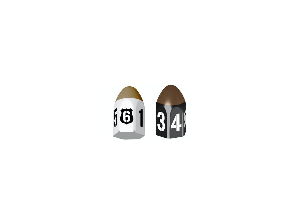 Two bullets with numbered faces resemble dice one white with black 561 numbers and a shield shape the other black with white 345 numbers