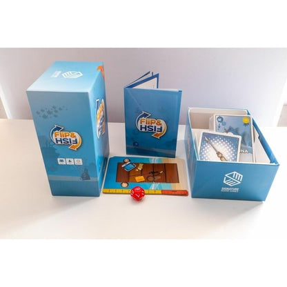 Blue Flip Fish board game box rulebook fishing mat cards and red dice