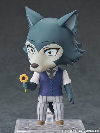 Nendoroid figure of Legoshi, the grey wolf, in a blue vest and striped pants, holding a sunflower