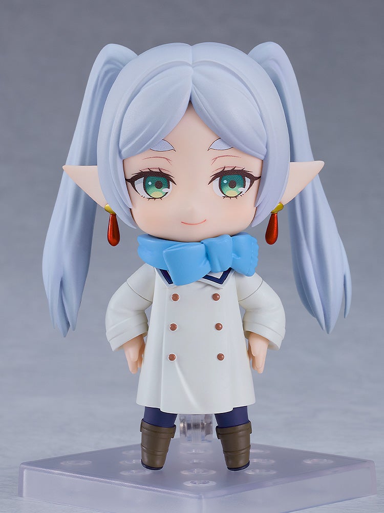 Frieren Beyond Journeys End Nendoroid Frieren in Winter Clothes light blue twin ponytails white coat with brown buttons blue scarf and elf ears