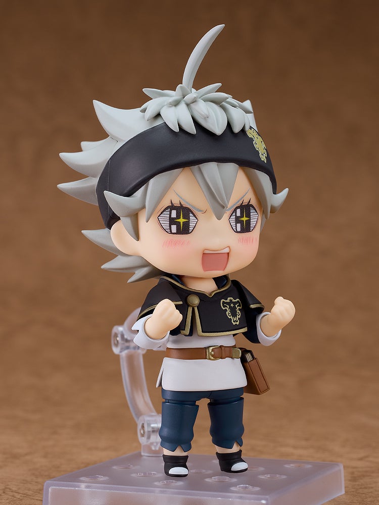 Nendoroid Asta from Black Clover, with spiky grey hair and black headband, shouts excitedly with clenched fists