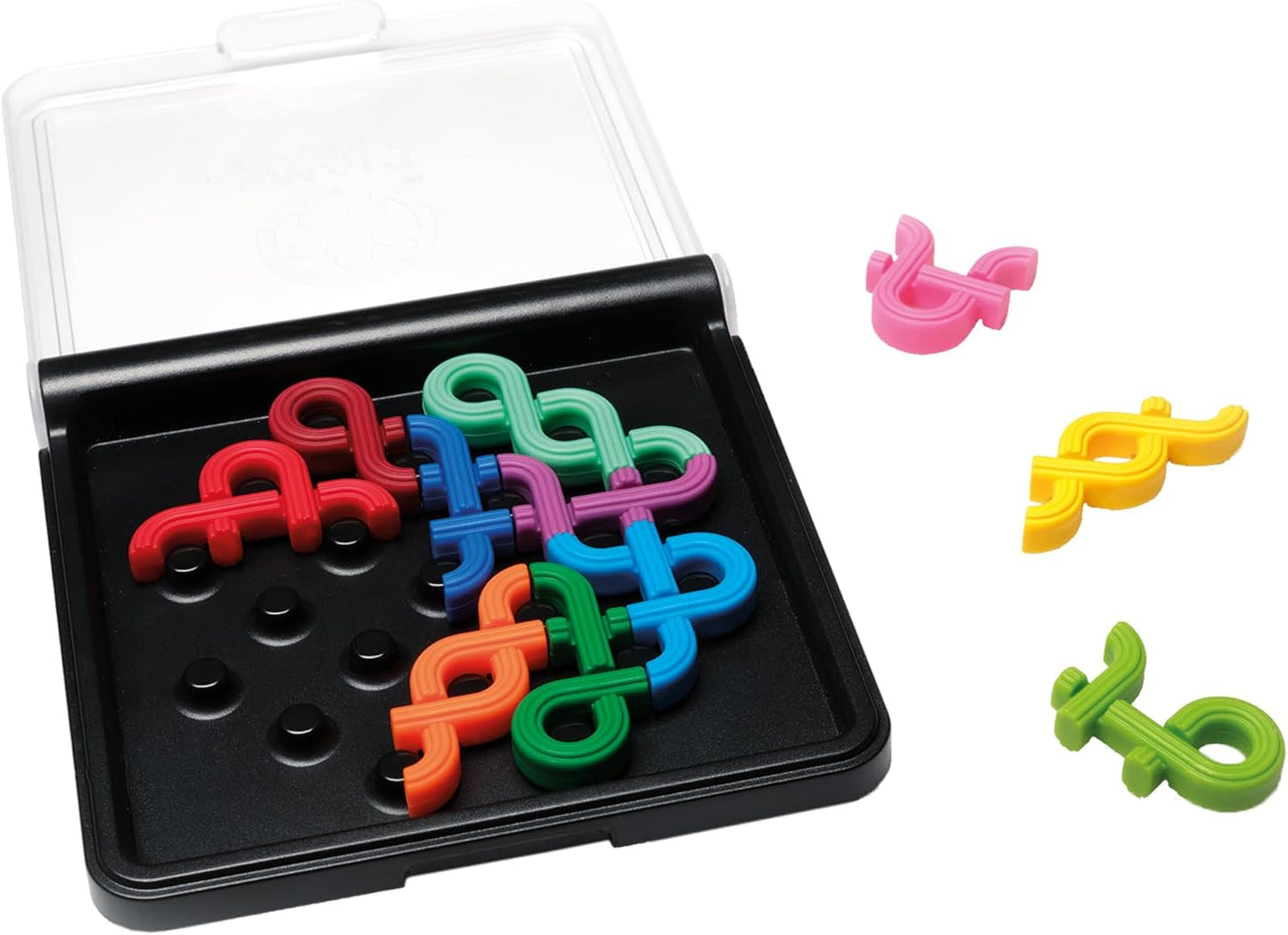 A logic puzzle with colorful, S-shaped pieces. Some interlocked on a black board in a clear case, others scattered