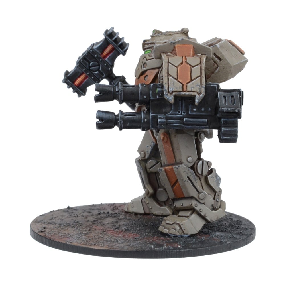 A beige and brown sci-fi mech miniature with two large guns, standing on a textured base.