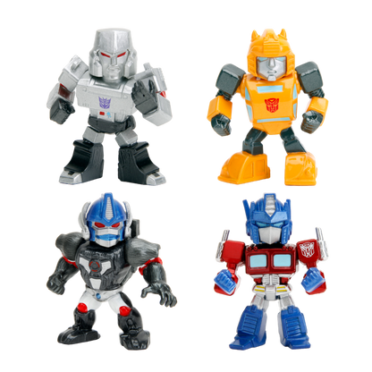 Four collectible vinyl Transformers mini figures: Optimus Prime, Megatron, Bumblebee, and Optimus Primal