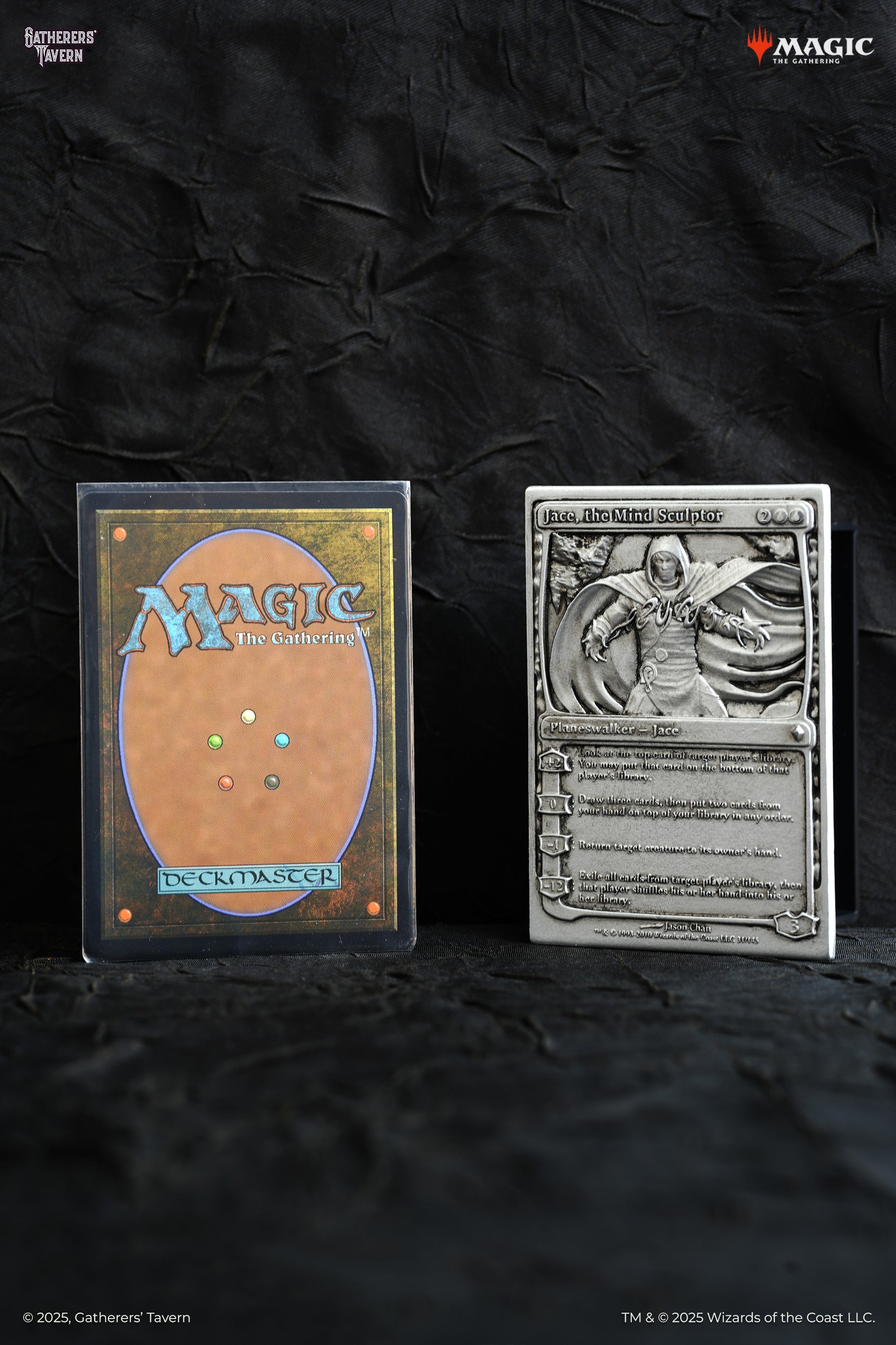 Magic: The Gathering card back in a sleeve and a metal Jace, the Mind Sculptor Planeswalker plaque on dark fabric