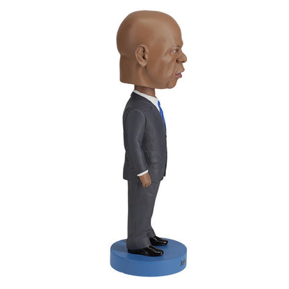 John Lewis Royal Bobbles bobblehead of the John Lewis in a grey suit on a blue base