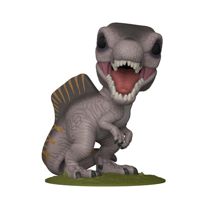 Funko Pop! Spinosaurus dinosaur figure, grey body, open mouth with sharp teeth, pink tongue, dark eyes, and a dark fin with orange stripes, standing on grass