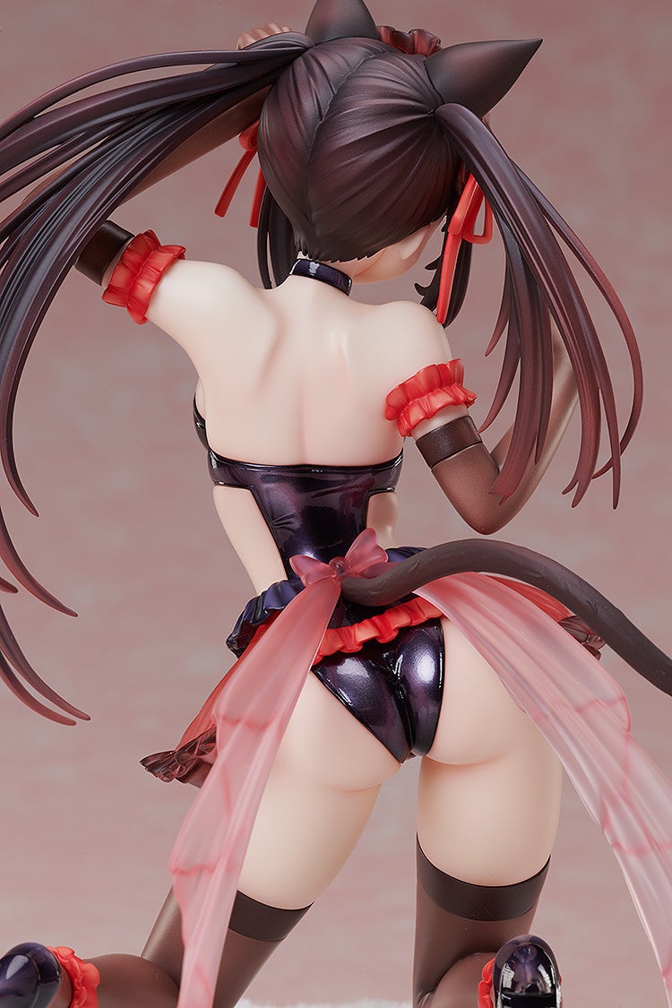 Anime figure of a woman with cat ears, twin tails, and a tail, in a shiny dark outfit with red ruffles and pink sheer fabric, back turned