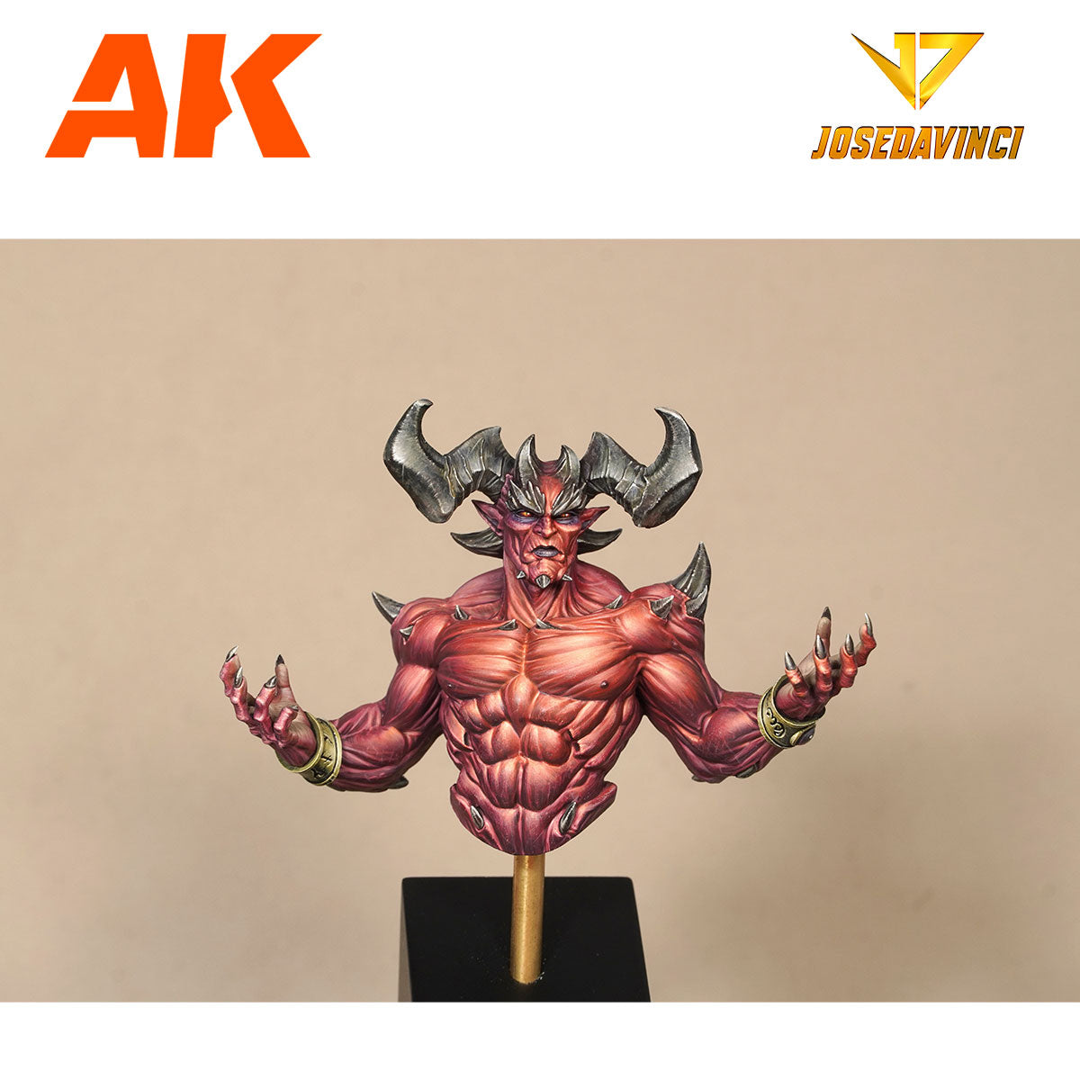 Painted miniature bust of a muscular red demon with large horns, spikes, and outstretched clawed hands