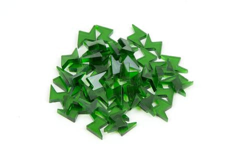Green plastic lightning tokens from Iello's King of Tokyo board game