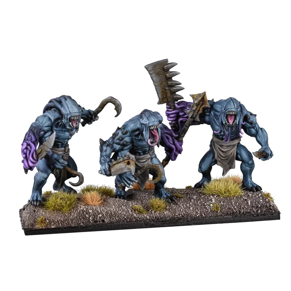 Three hulking blue-grey monster miniatures, fanged, tentacled, wielding a hook, cleaver, and spiked axe