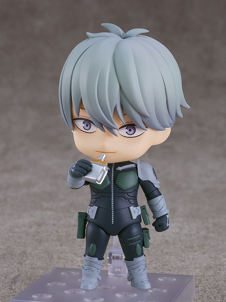Kaiju No 8 Nendoroid Reno Ichikawa figure in dark gray and green uniform holding a small bottle