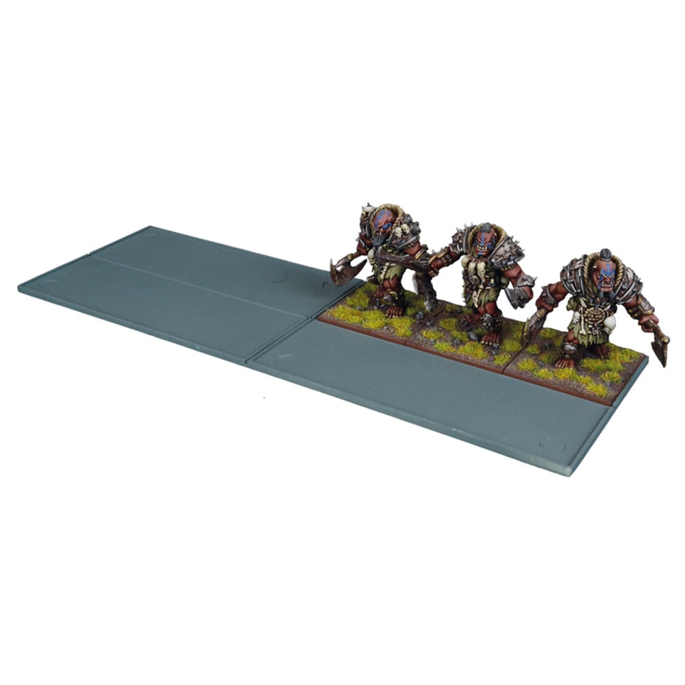 Three armored fantasy wargaming miniatures with weapons, on a grey movement tray